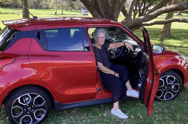 Lesley Rae and her Swift Sport